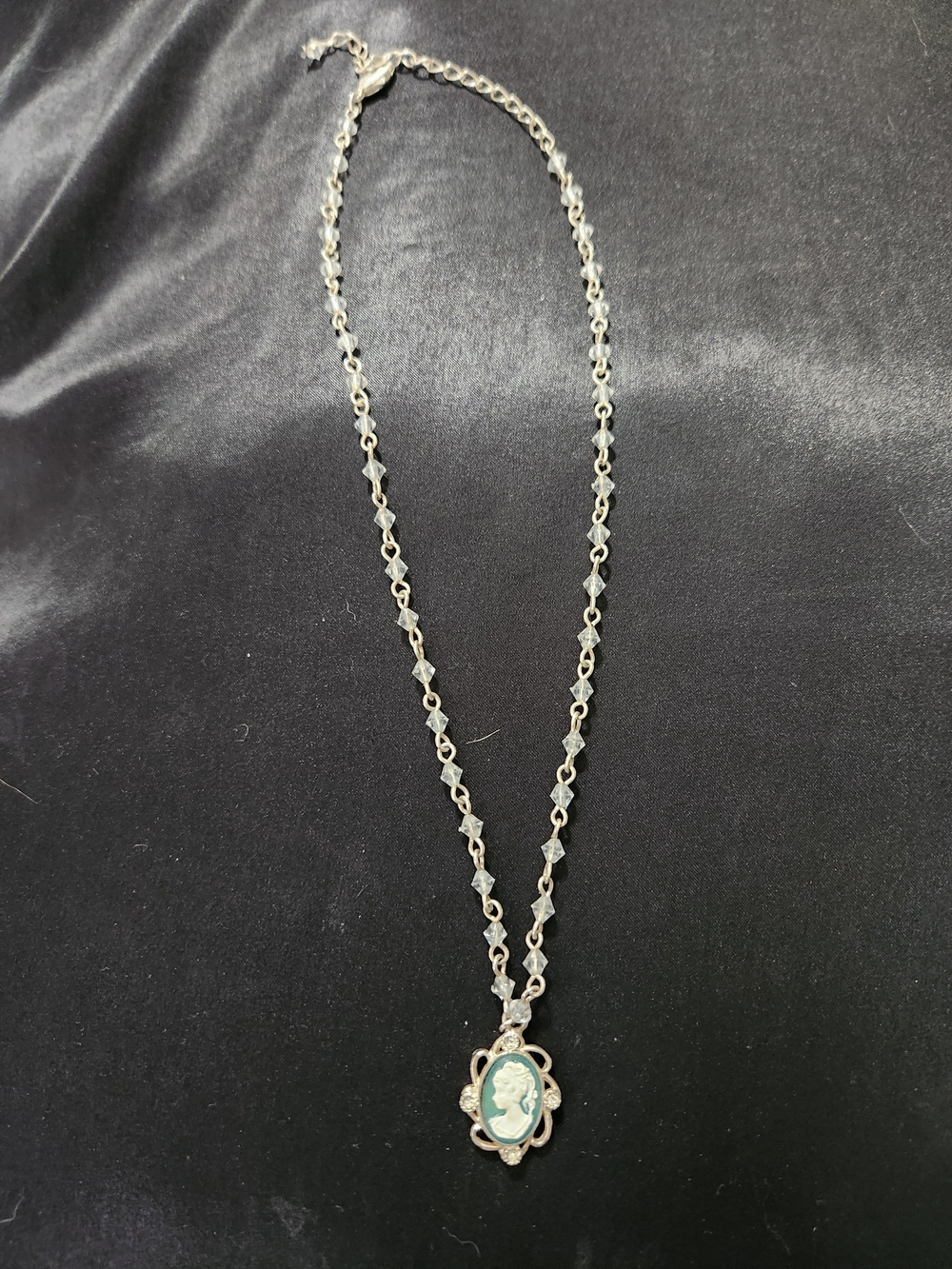 Vintage-Style Silver Cameo Pendant Necklace in Light Green Left Facing